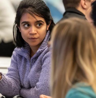 Students sitting together at table